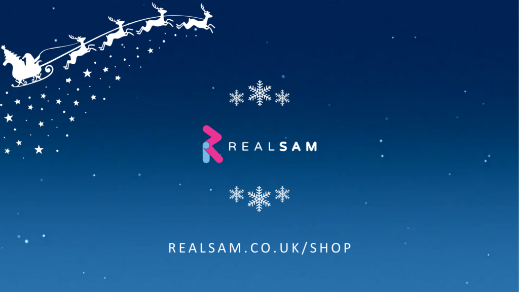 Image of the real sam logo on a starry night blue background with white reindeer in the top left corner and the website address www.realsam.co.uk on the bottom